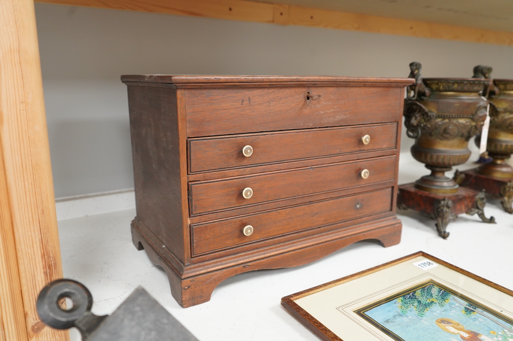 An early 19th century mahogany three drawer collector’s cabinet, with circular ivory handles, 40cm wide x 28cm high CITES Submission Reference O28HYZ0E